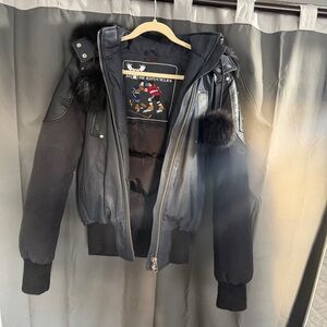 Moose Knuckles “Denim” and Black Puffer Bomber with Fur Trim || size M